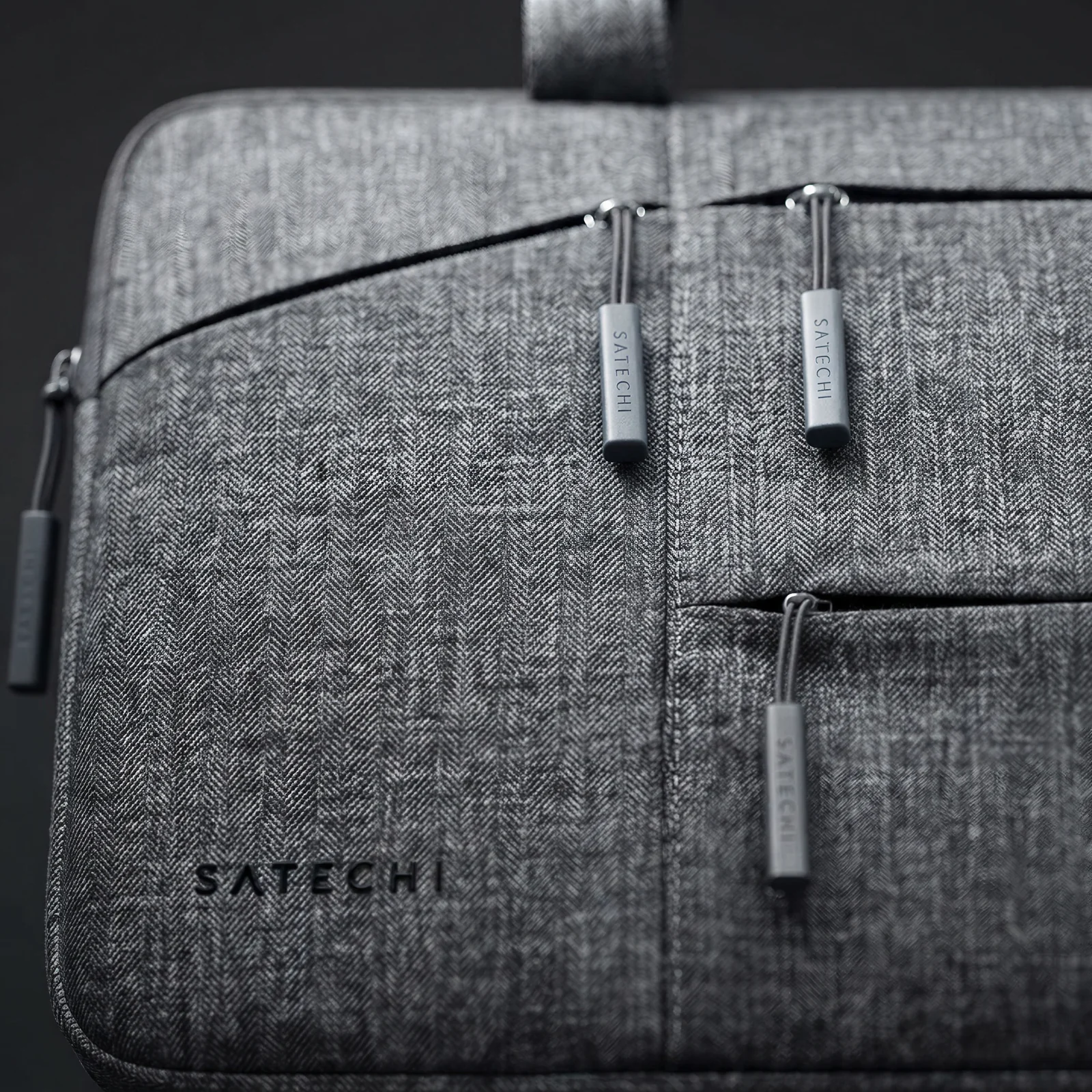 Close detail of the briefcase fabric and zipper